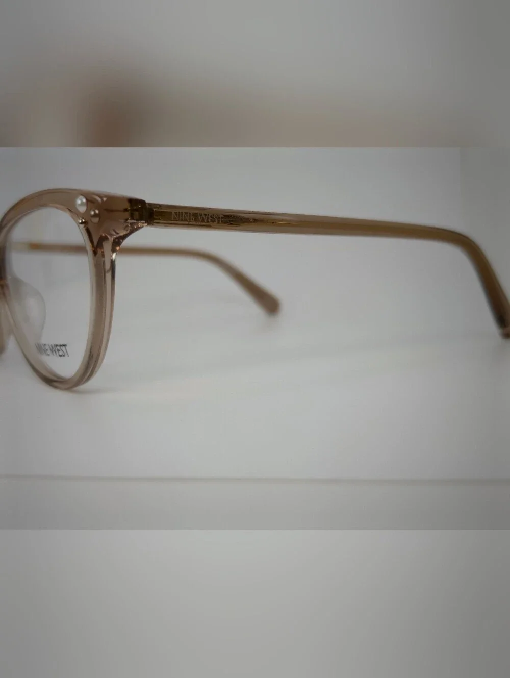 Nine West NW5152 Taupe Cat-Eye Eyeglass Frames with Pearl Accent.